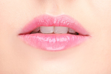 Fototapeta premium Lips of beautiful young woman, closeup
