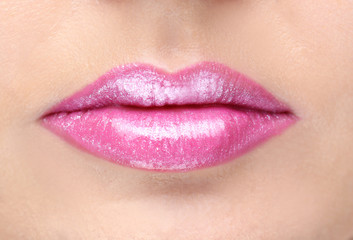 Lips of beautiful young woman, closeup