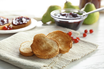 Tasty breakfast toasts on table