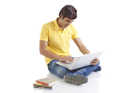 Young man working on a laptop