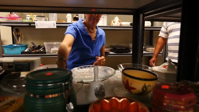 A woman shopping in a resale shop