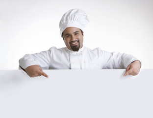 Portrait of chef pointing