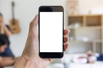 Close up of a man hand hold smartphone with blank screen mobile in office and business working blur background.