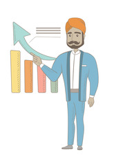 Hindu successful businessman pointing at chart going up. Businessman satisfied by his business success. Business success concept. Vector sketch cartoon illustration isolated on white background.