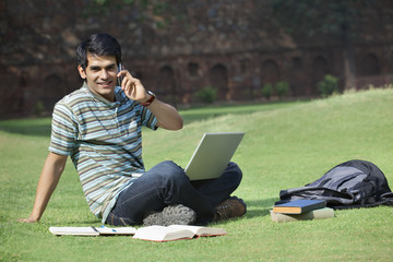 Portrait of a student talking on a mobile phone