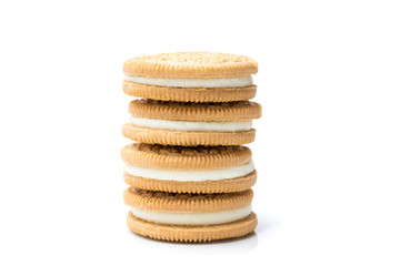 cream filling cookies stacked isolated on white background