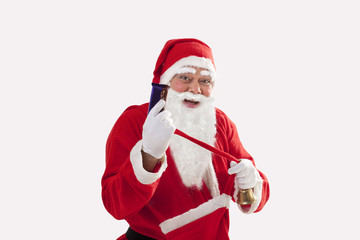 Portrait of cheerful Santa Claus showing chocolate over white background 