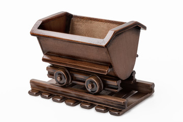 Wooden trolley toy with rails.