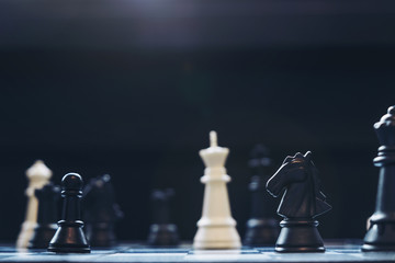 Chess pawns on the chessboard with selective focus