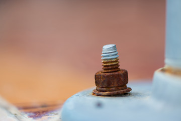 Old rusty steel bolt and nut