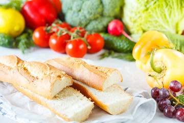 Summer sandwiches with baguette, cheese and tomatoes