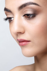 Close-up portrait of beautiful big-eyed young woman