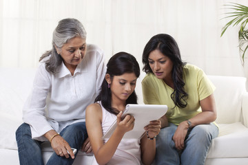 Family reading documents at home 