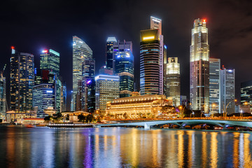 Fototapeta na wymiar Beautiful night view of skyscrapers by Marina Bay, Singapore