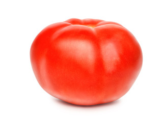 Red whole tomato isolated on a white background, close-up. A fresh tomato cut out with the texture and clipping path.