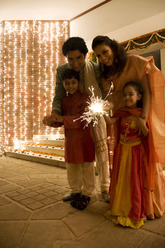 Family playing with firecrackers 