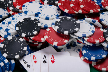 Four aces on the table, and a lot of game money