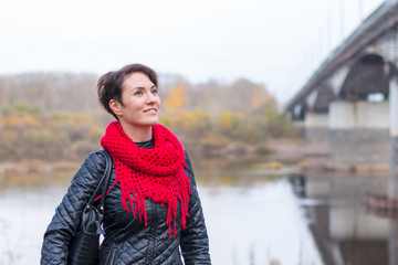Obraz premium Nice girl in red scarf outdoor