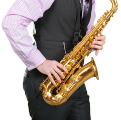 Obraz premium Man playing on a saxophone