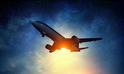 Airliner in sky. Mixed media