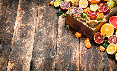 Citrus background. Citrus fruits in an old box.