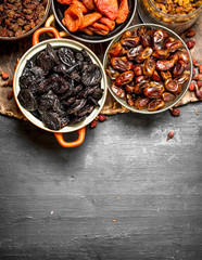 Dried fruits in bowls.