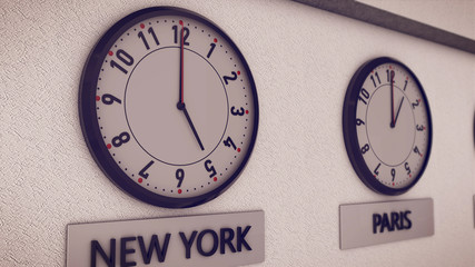 Clocks on wall, symbol for Greenwich Mean Time