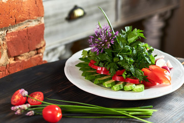 Fresh salad of tomatoes, cucumbers, peppers, arugula and dill jpg