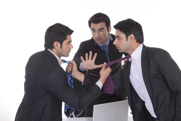 Businessmen getting into a fight