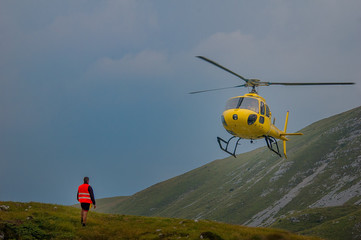Fototapeta na wymiar Helicopter in mountain rescue