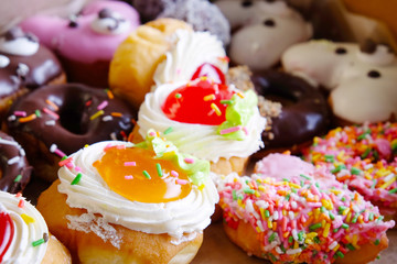 Various Donut, Chocolate frosted, Fruit jams and more.