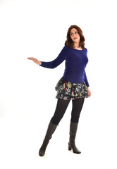 Full length portrait of a brunette girl wearing casual modern clothes. standing pose, isolated against white background
