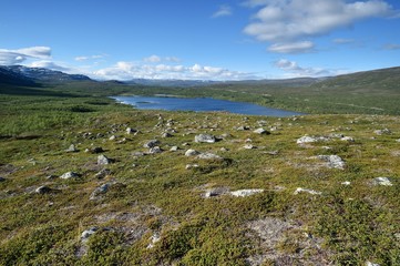 Fototapeta na wymiar Rocky landscape with mountains in Lapland, Malla National Reserve