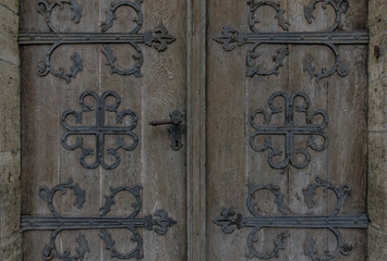 The old vintage door with handle and keyhole