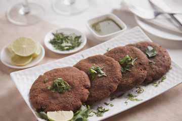 Close-up of fried cutlets arranged in plate