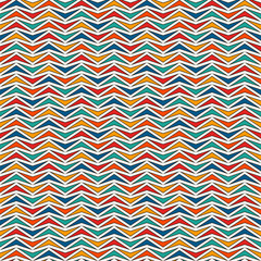 Bright colors seamless pattern with repeated stylized triangles mosaic. Zigzag abstract background. Vivid digital paper