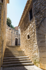Fototapeta na wymiar medieval stone walls and stairs in Girona spain