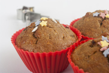 Christmas muffins close up on white