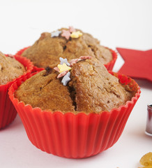 Christmas muffins close up on white