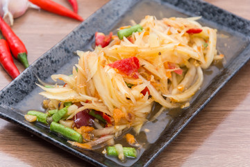 papaya salad (som tum thai) on plate