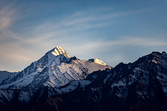 Sunset scene of snow mountain.