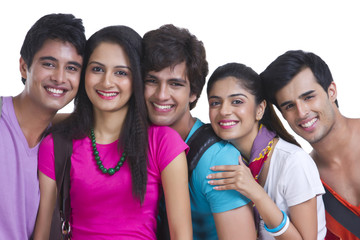 Portrait of university friends smiling together on white background