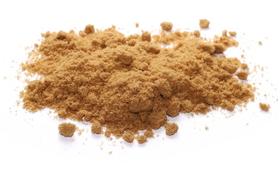 Unrefined light brown cane sugar isolated on white background