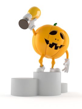 Halloween pumpkin character holding golden trophy