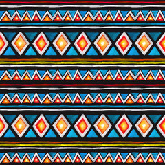Tribal pattern. Seamless pattern - tribal ornament in geometric style with triangles and stripes. Watercolor