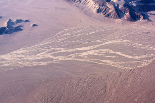 Desert with sand rugged barren hilly terrains aerial view