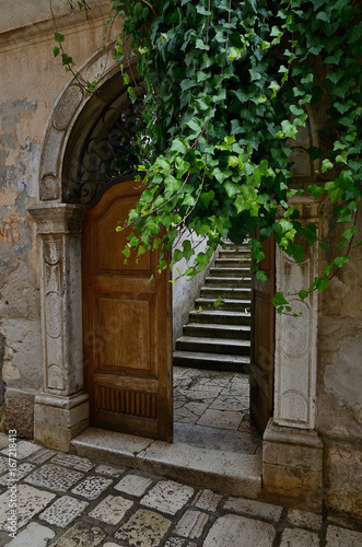 porec old gate with dooor and steps croatia stock photo and