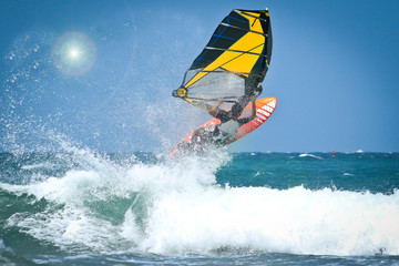 Windsurfing jumps out of the water