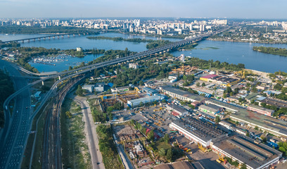 Aerial top view of industrial park zone from above, factory chimneys and warehouses, industry district in Kiev (Kyiv), Ukraine
