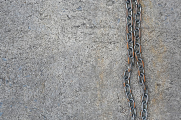 Chain on the cement floor.